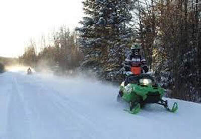 winter snowmobiling in northern Minnesota